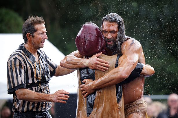 30 photos from World Gravy Wrestling Championships 2024 as contestants take the plunge