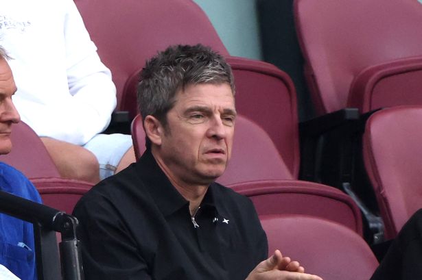 Noel Gallagher looks tense at football match as Oasis ticket prices spark fan outrage