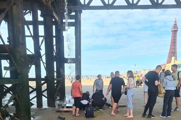 Shocking moment woman falls through hole in Blackpool Central Pier as public evacuated