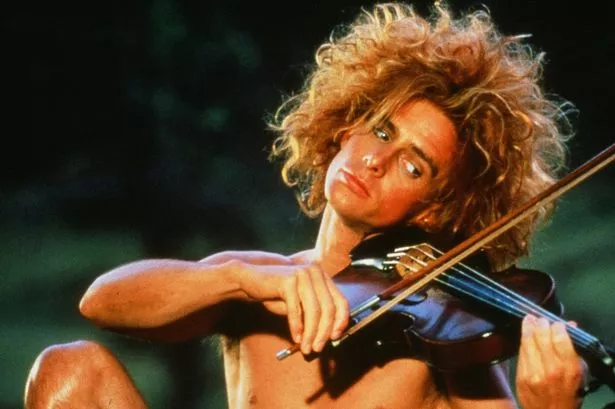 Rarely-seen Young Einstein star Yahoo Serious, 71, unrecognisable on day at beach