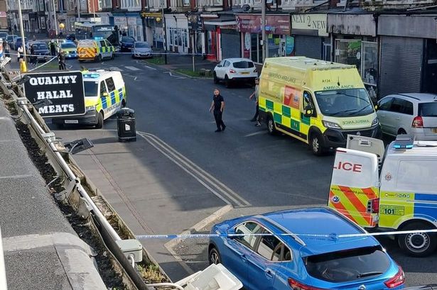 Pedestrian hit by taxi with major Blackpool road cordoned off by police