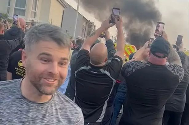 Ex-cop filmed laughing with Southport rioters as police van set on fire