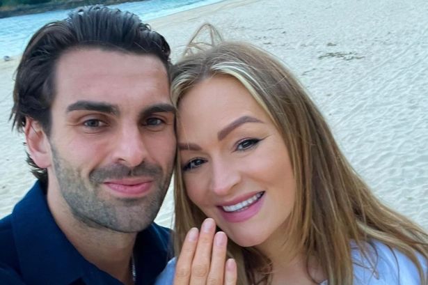 See all Adam Collard and Laura Woods’ romantic engagement pics after Love Island star got down on one knee on Cornwall beach