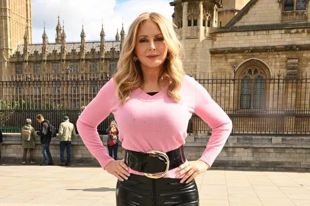 Carol Vorderman shows off her incredible curves at 63 as she poses in tight top and PVC trousers