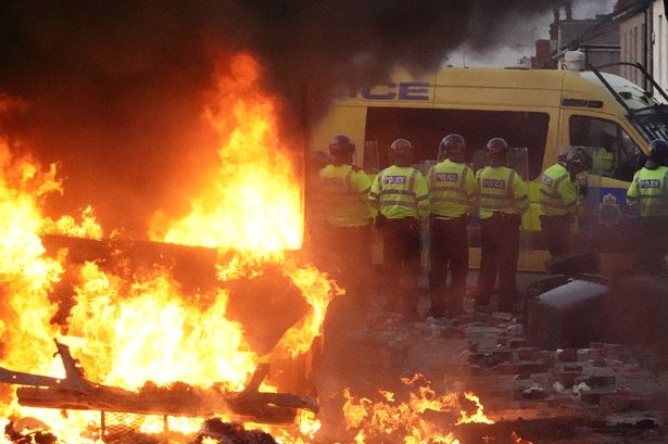 Boy rioter, 12, appears at court in school shoes after handing himself in