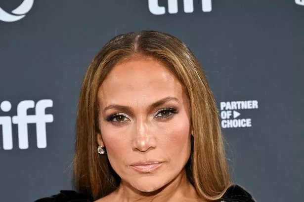 Jennifer Lopez and Ben Affleck avoid awkward run-in at film premiere as she turns heads in sideless dress