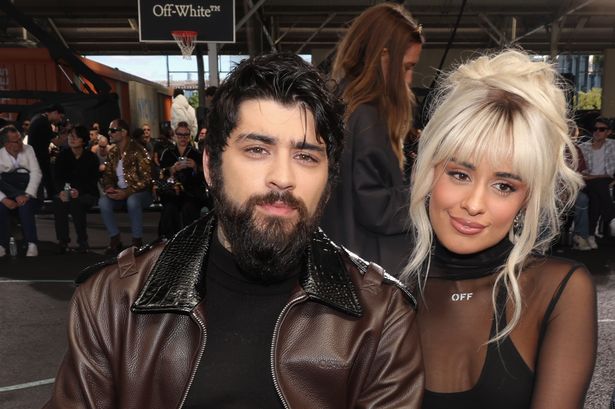 One Direction’s Zayn Malik is barely recognisable as he attends fashion show with Camila Cabello