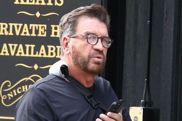 Nick Knowles seen with major injury that could rule him out of Strictly as he goes for a walk with girlfriend Katie Dadzie