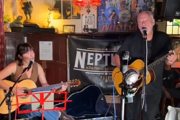 Man steps up to play at open mic night – then people realise he’s a world-famous star