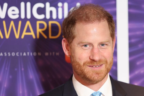 Prince Harry smiles as he arrives to London awards show – as King Charles meeting ‘unlikely’