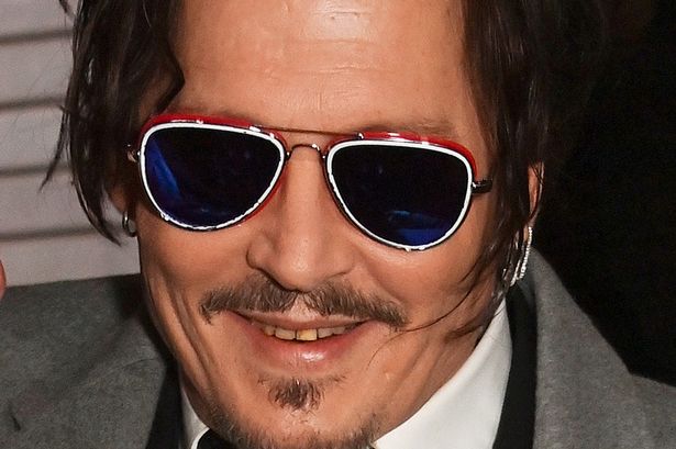 Johnny Depp shows off dental makeover after shocking fans with ‘rotting’ teeth