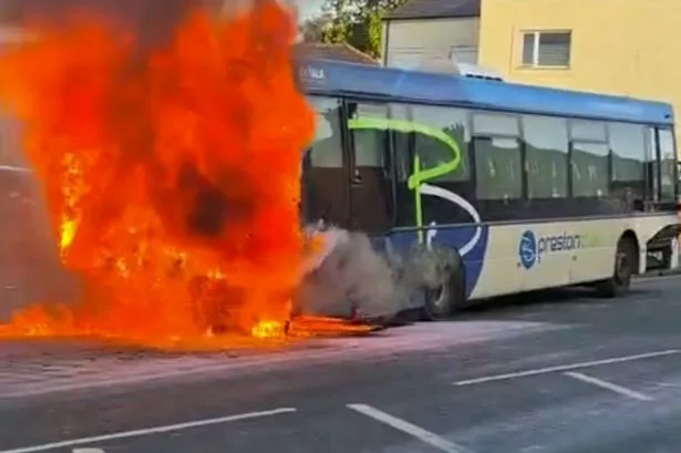 Police partially open road in Preston city centre following dramatic bus fire