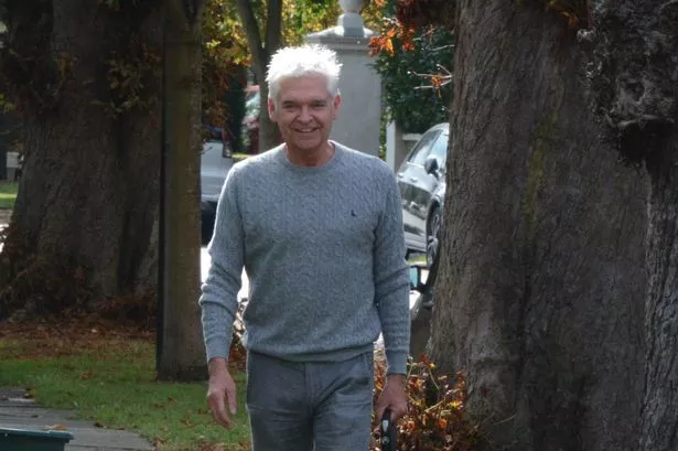 Phillip Schofield looks content on dog walk in first pics as TV comeback after This Morning scandal is revealed