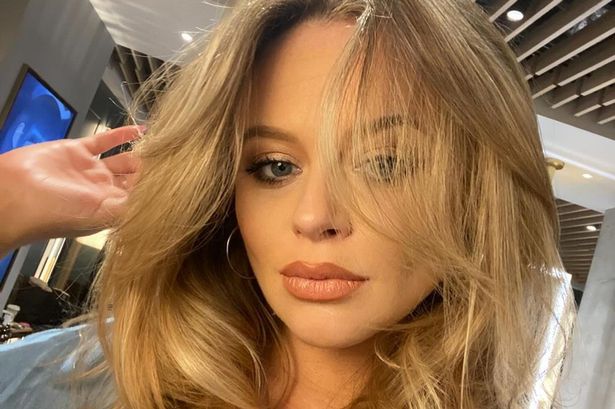 Emily Atack flaunts incredible curves in plunging swimsuit three months after giving birth