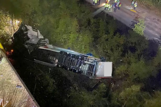 Horror as lorry falls 60m off M6 bridge leaving motorway closed