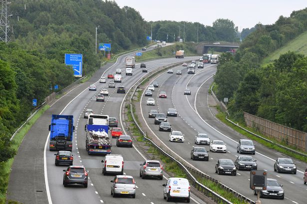 Woman, 60, dies after falling from motorway bridge and being hit by ‘a number of vehicles’