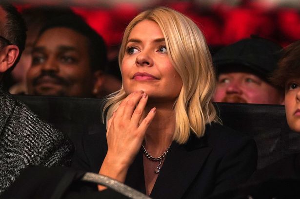 Holly Willoughby goes out in London as Phillip Schofield’s comeback TV show airs – and he mocks her on screen