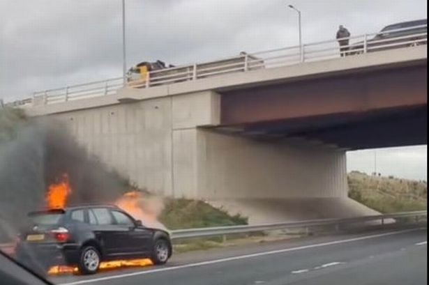 Live updates as car on fire causes ‘severe delays’ and queuing traffic on M55