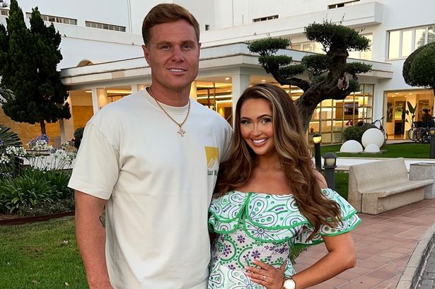 Charlotte Dawson reunites with shamed fiancé as pair spotted checking into hotel together