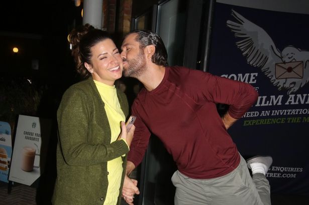 BBC Strictly Come Dancing stars loved up as they arrive back in hotel