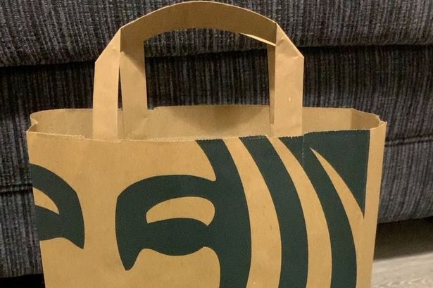 Woman laughing as Starbucks Too Good To Go bag has ‘endless supply’