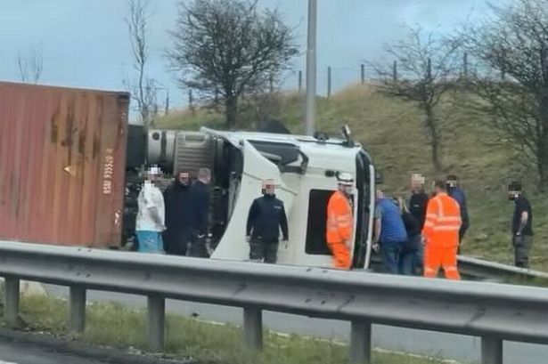 Astonishing drone pictures show dramatic scenes after lorry crashes across whole of major Lancashire route