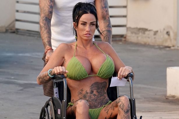 Katie Price suffers new holiday nightmare after accident that left her in a wheelchair – as she’s wheeled by boyfriend JJ