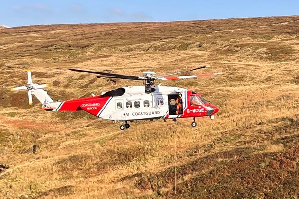 Air ambulance lands after crash shuts road and woman rushed to hospital