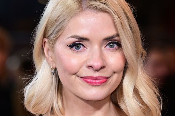 Holly Willoughby wows in plunging black dress with pal Nicole Appleton at Robbie Williams’ biopic premiere