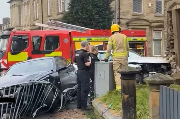 ‘Here we go again’ – BMW driver in hospital and Audi SUV smashes into house in Lancashire town infamous for bad crashes