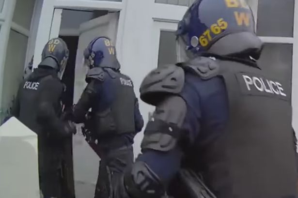 Dramatic moment police in riot gear storm Blackpool houses as arrests made