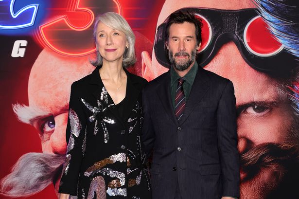 Keanu Reeves joined by rarely-seen girlfriend as they pose at LA premiere