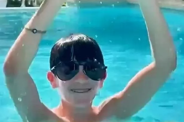 Simon Cowell shares rare home life moment in swimming pool with son Eric