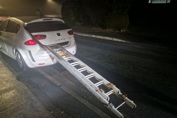 ‘That’s a step too far’ – Lancashire Police post snap of driver with huge ladder hanging out of his boot and the Facebook replies don’t disappoint