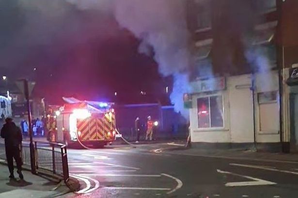 Firefighters battle blaze at pizza takeaway on Christmas Day