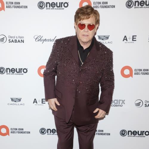 Elton John jokes about deteriorating eyesight as he presents Golden Globe