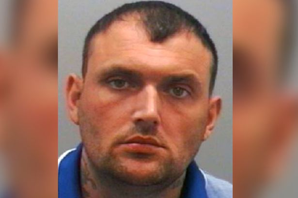 Cruel burglar who pulled knife on elderly relative dies in prison