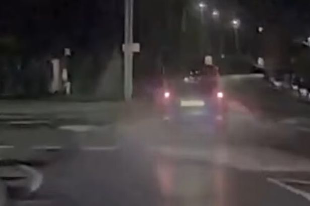 Dramatic moment driver in stolen car leads police on dangerous 106mph chase and runs red lights