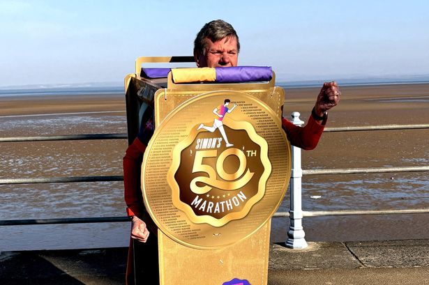 Superfit dad dresses up as medal for 50th and final marathon in Guinness World Record attempt