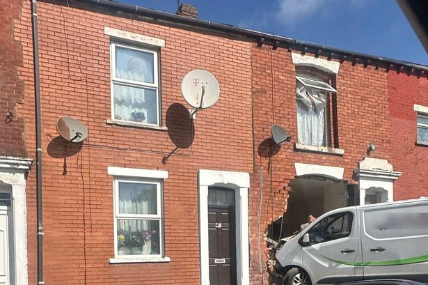 Two men injured after van ploughs through front of Blackburn house