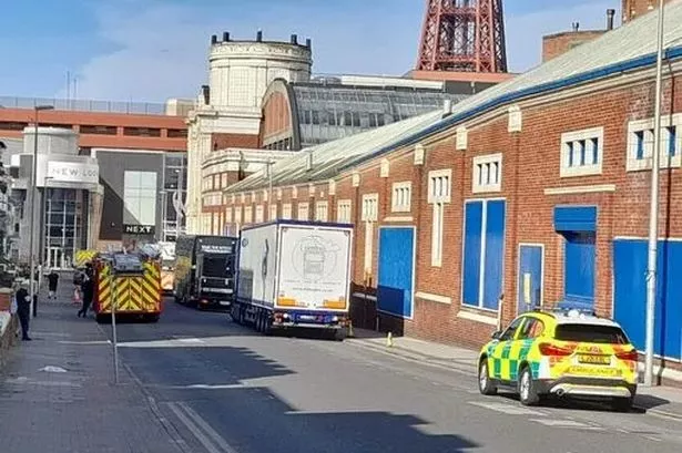 Suspect named after man assaults cops then climbs onto roof of shopping centre