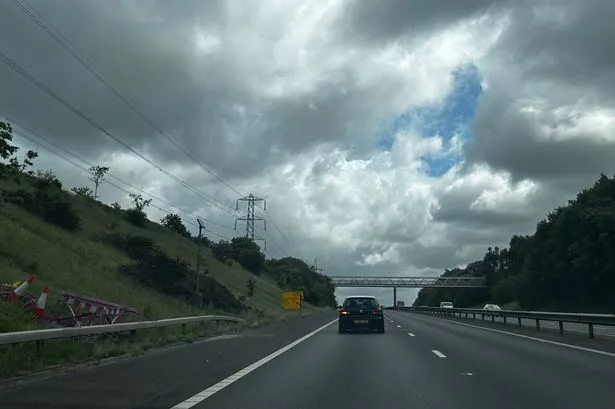 Why a temporary sign has been in place on the M65 for over a year
