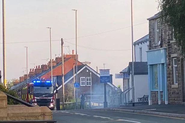 Fire crews spotted at Accrington Tesco as smoke fills air