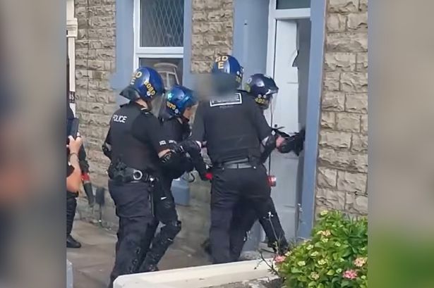 Police saw down door and raid house in Darwen before boy arrested