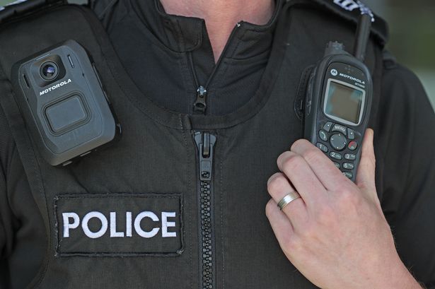 Dog attack leaves police officer and robbery victim in hospital as three arrested