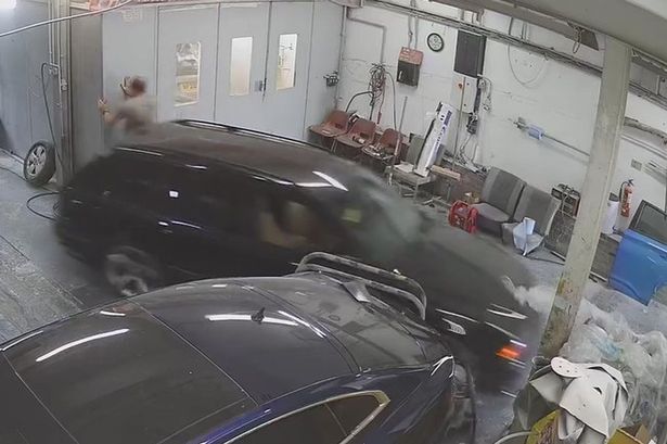 Garage owner’s genitals crushed by out-of-control BMW