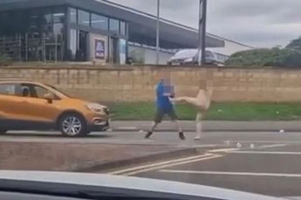 Terrifying moment naked man attacks driver and tries to get in car with family inside