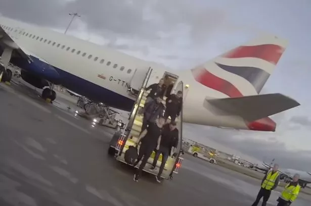 Watch moment killer Thomas Dures lands at Heathrow after 18 months on the run