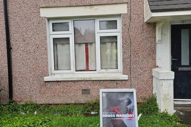 Dog rescued as house used for suspected drug den raided by police