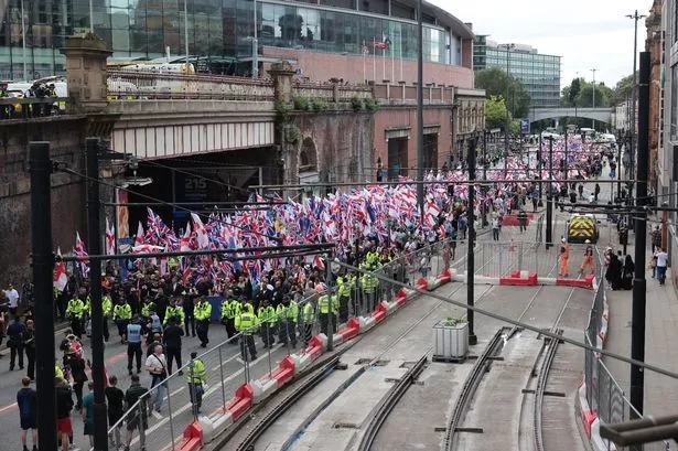 Hundreds of protesters gather in Manchester city centre